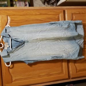 Like new sleeveless collared dress with pockets.